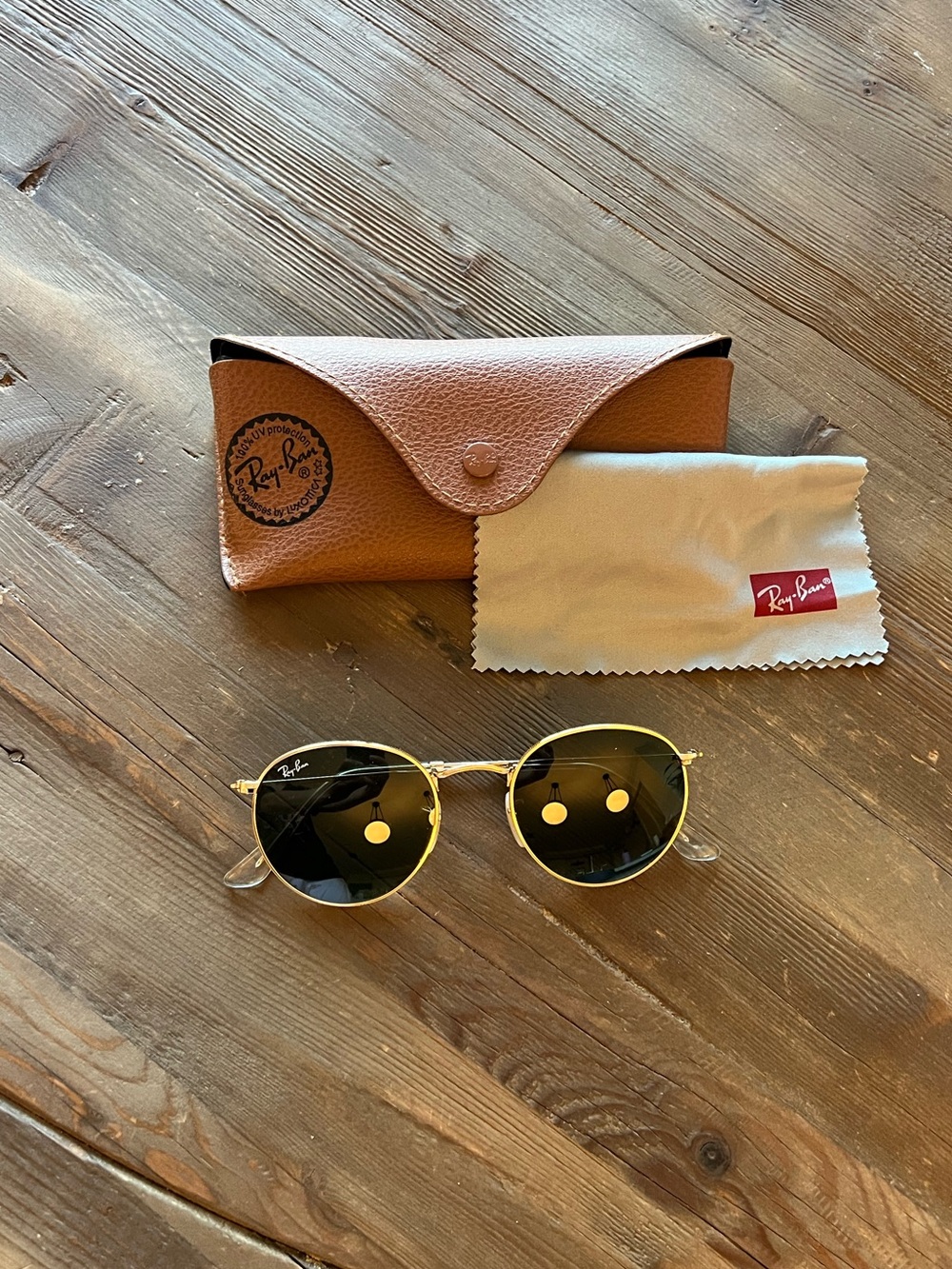 Ray-Ban Round Gold Frame Sunglasses with Dark Green Lenses